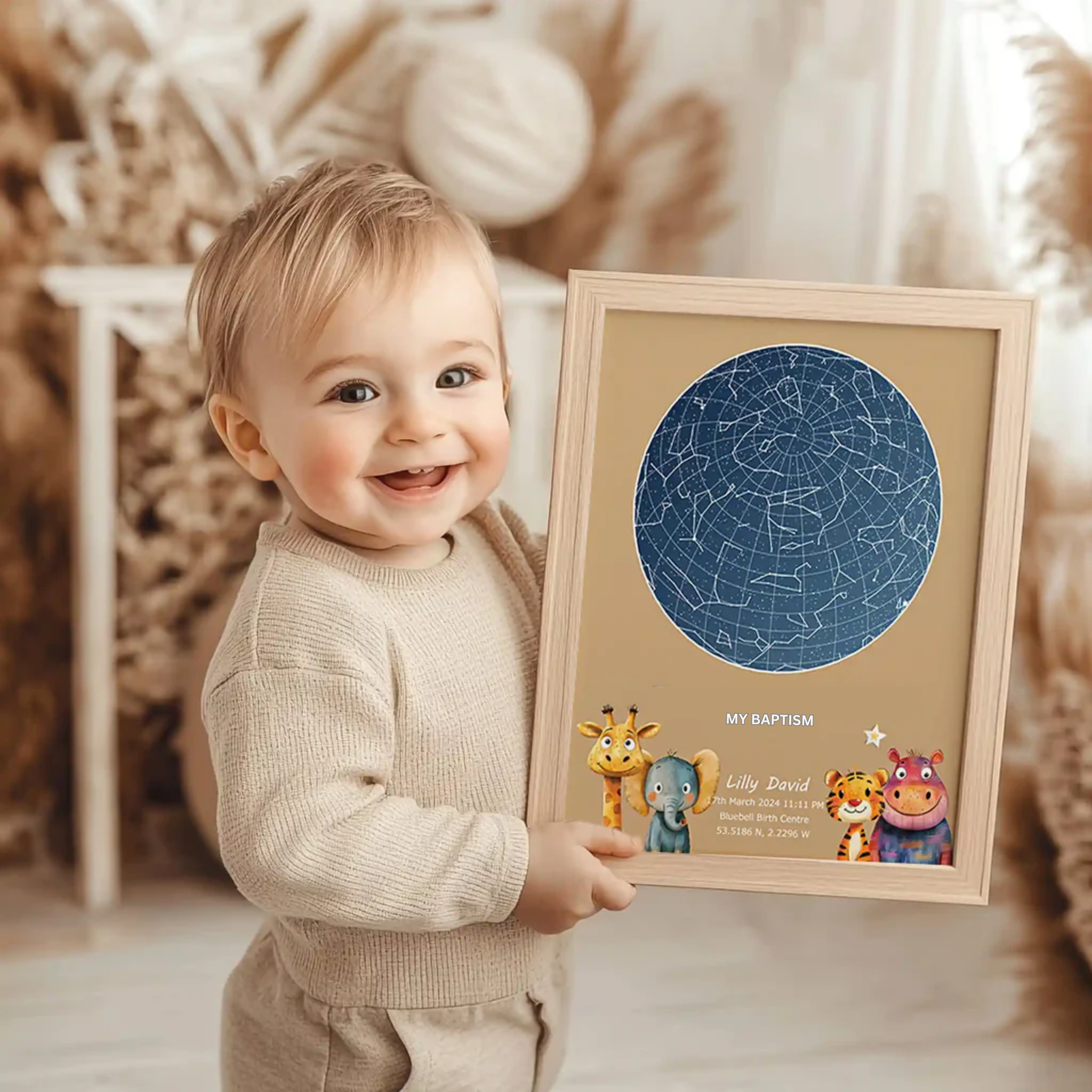 young boy posing with his star map, celebrating his baptism.