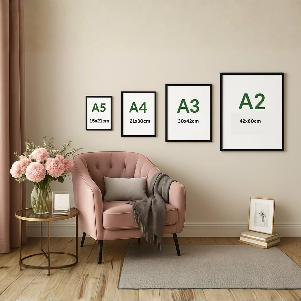 Framed wall art size guide in modern living room with pink armchair and flowers